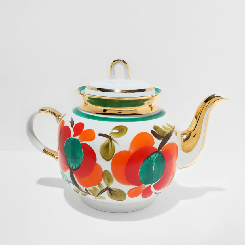 Vintage porcelain teapot with orange flowers