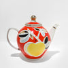 Vintage red porcelain teapot and black sugar bowl set